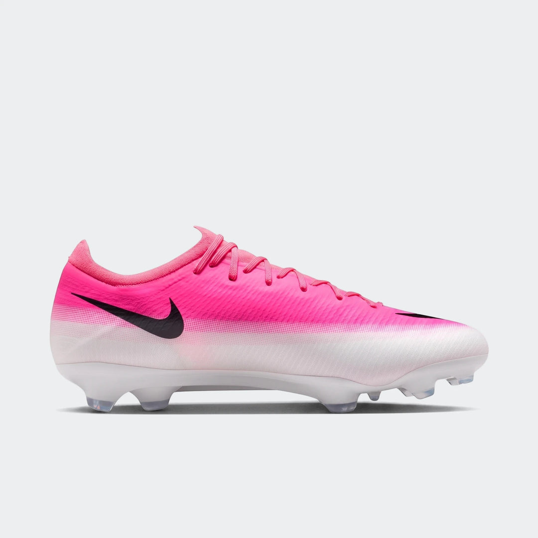 Side view of Nike Mercurial Vapor 17 Pro Firm-Ground Low-Top Soccer Cleats, featuring a vibrant pink and white design with a
