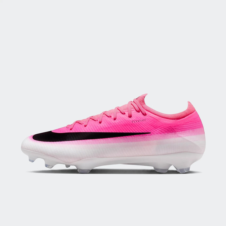 Nike Mercurial Vapor 17 Pro firm-ground low-top soccer cleats in a pink and white gradient with black swoosh, side view.