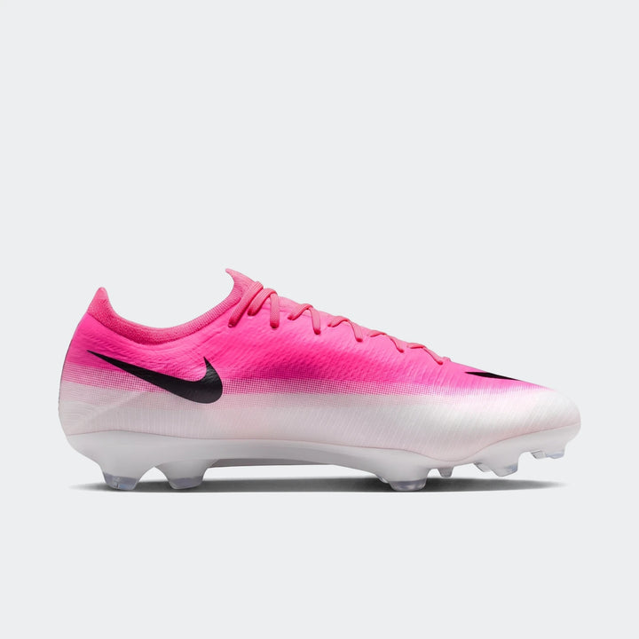 Pink and white Nike Mercurial Vapor 17 Pro Firm-Ground Low-Top Soccer Cleats with black swoosh, side view.