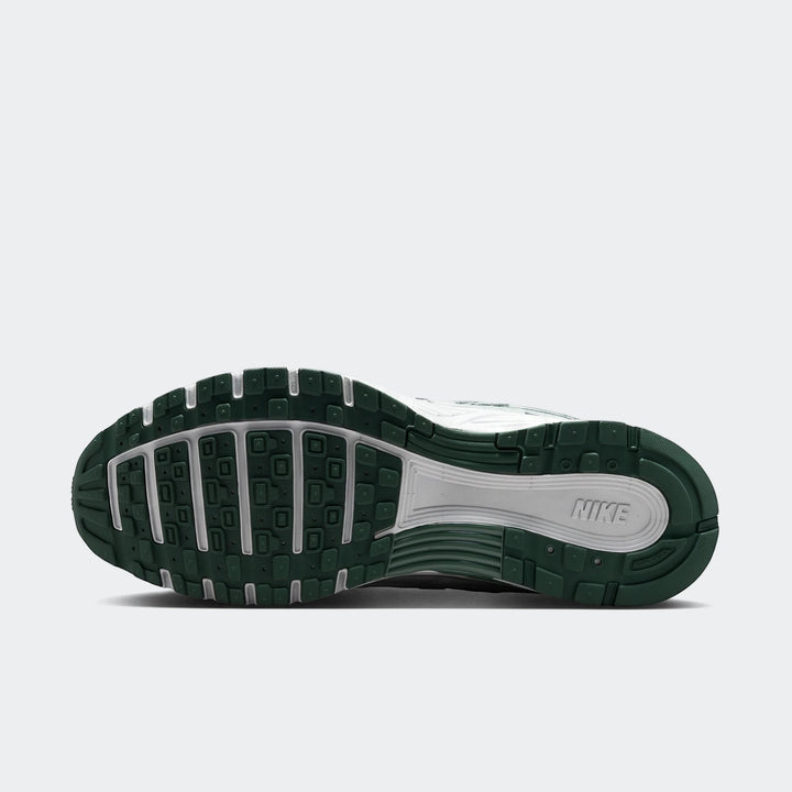 Nike P-6000 men's shoes in dark green with a white midsole, rugged tread outsole designed for running and training.