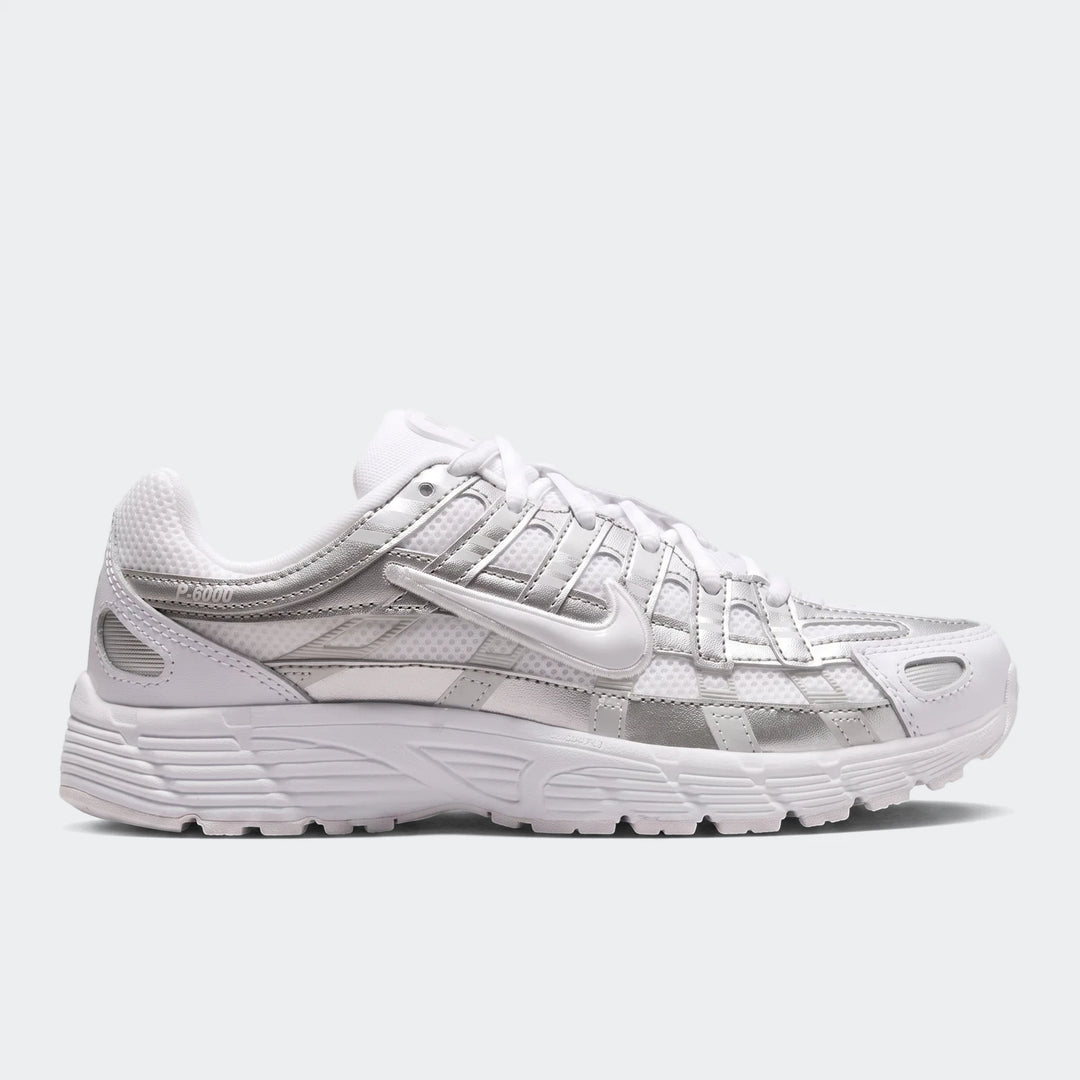Nike P-6000 White Sneakers. A single white and metallic silver athletic shoe, viewed from the side, on a clean background.