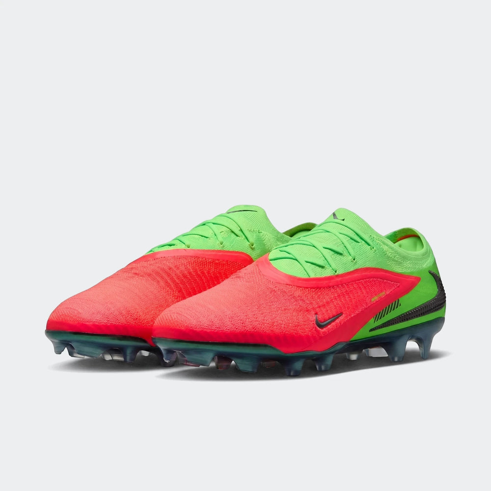 Nike Phantom 6 Low Elite 'Erling Haaland' firm-ground soccer cleats in vibrant red and lime green, shown in a side view.