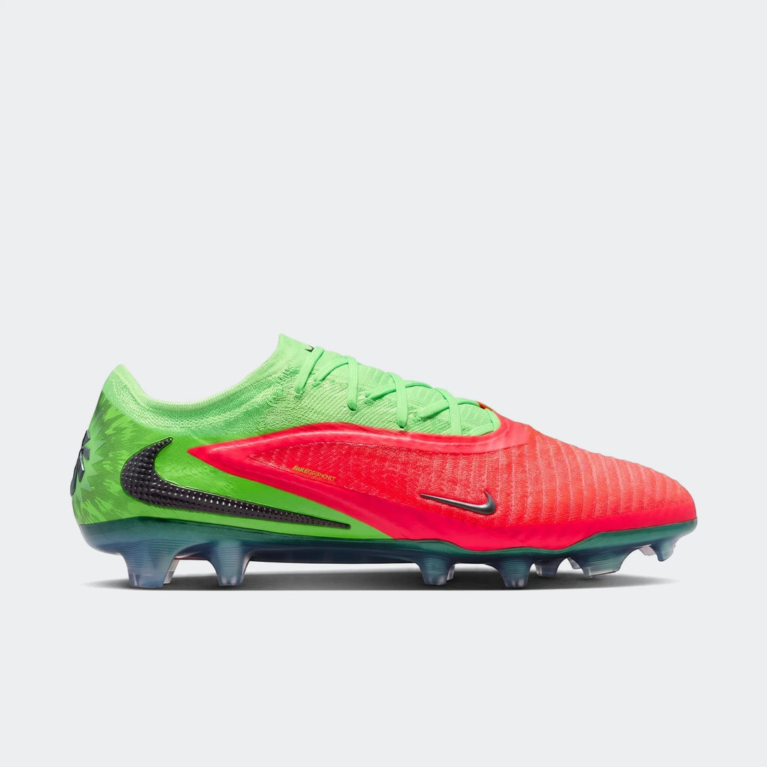 Nike Phantom 6 Low Elite Erling Haaland firm-ground soccer cleats in vibrant red and green, shown from a side view.