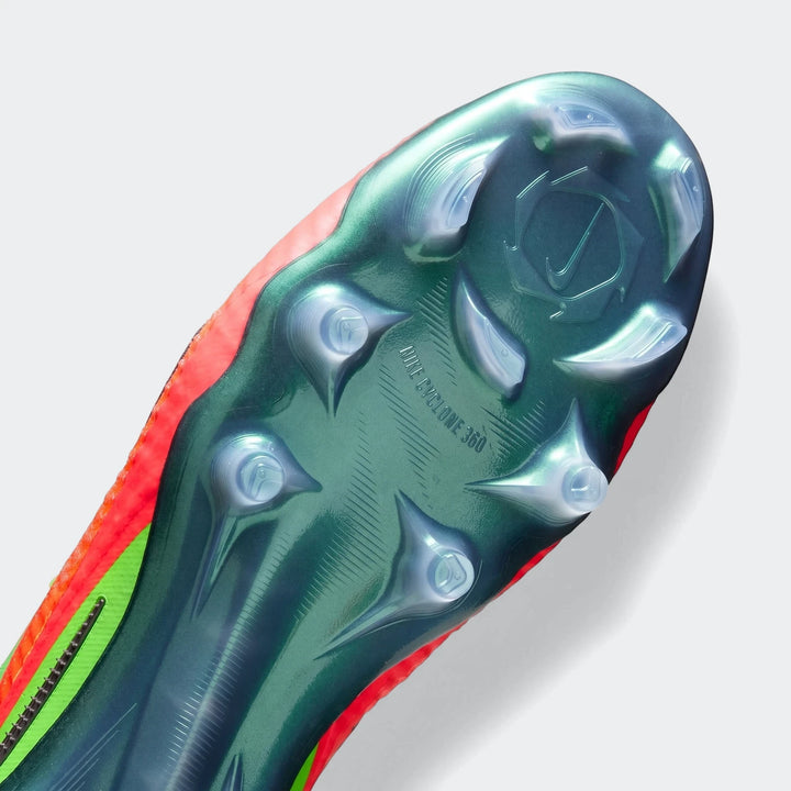 Nike Phantom 6 Low Elite Erling Haaland firm-ground soccer cleat, showing the green sole with studs and red upper.