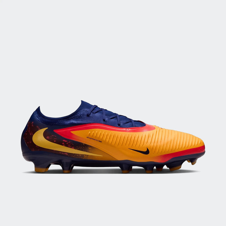 Nike Phantom 6 Low Pro Fg Orange Boots, side view, with red, blue, and gold accents, designed for firm ground soccer.