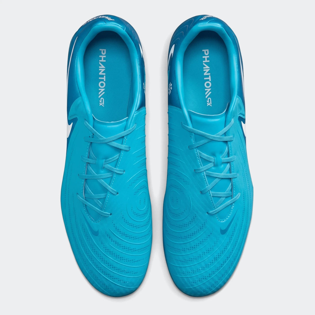 Top-down view of two vibrant blue Nike Phantom GX 11 Club Fg/Mg soccer boots with white swooshes and textured uppers.