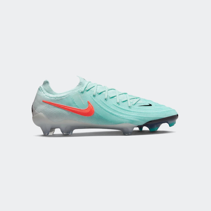 Nike Phantom Gx 11 Club Fg/Mg football boots in mint green with a coral orange swoosh, designed for firm ground/multi-ground