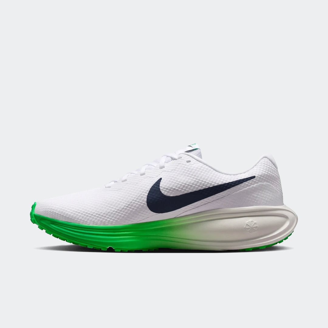 Nike Revolution 8 Men's Road Running Shoes in white with a dark blue swoosh and green sole, side view.