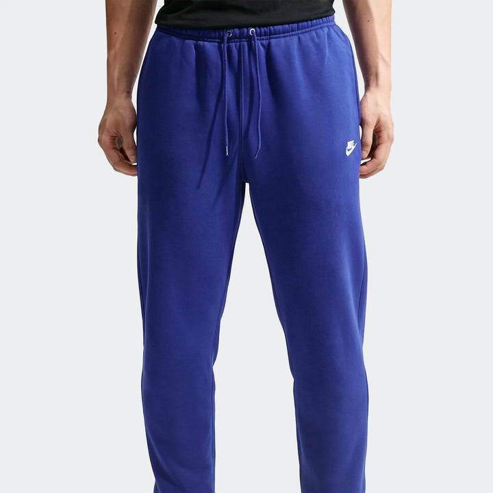 Nike Sportswear Club Men's Joggers in royal blue fleece, featuring a drawstring waist and visible Nike logo.