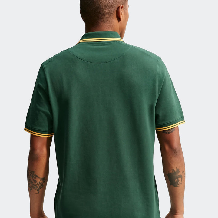 Rear view of a men's Nike Springboks Pique Polo Golfer in green with gold striped collar and sleeve cuffs.