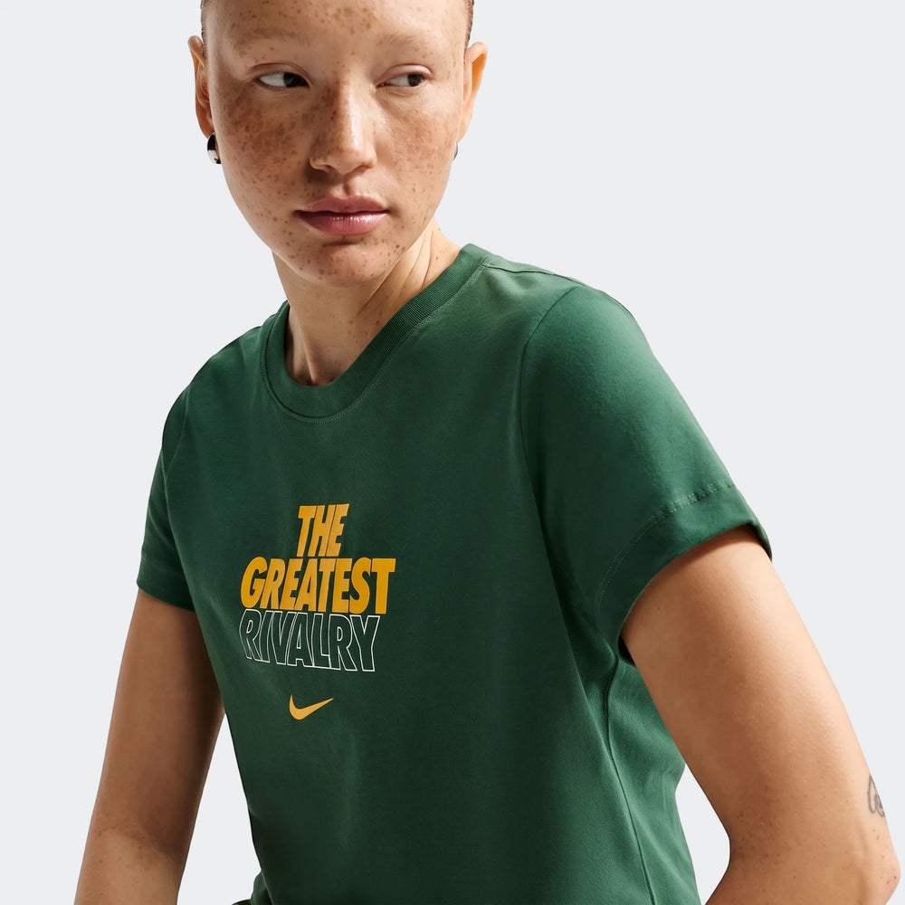 Woman wears a dark green Nike Springboks Rugby T-shirt, featuring the 'Greatest Rivalry' graphic and a yellow swoosh, shown