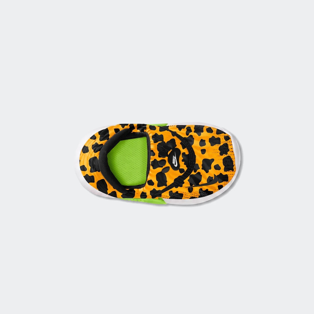 Nike Swoosh Go Baby/Toddler shoes with yellow and black leopard print, viewed from above, on a white background.