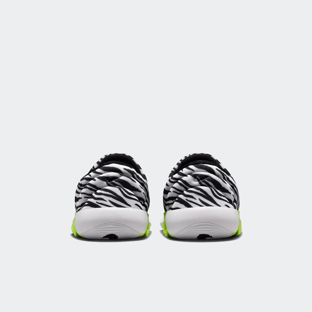Rear view of Nike Swoosh Go Baby/Toddler Shoes featuring a black and white zebra print upper and neon green sole accents.
