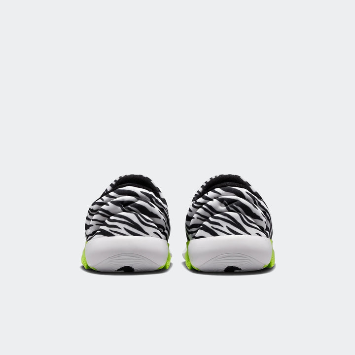 Rear view of Nike Swoosh Go Baby/Toddler Shoes featuring a black and white zebra print upper and neon green sole accents.