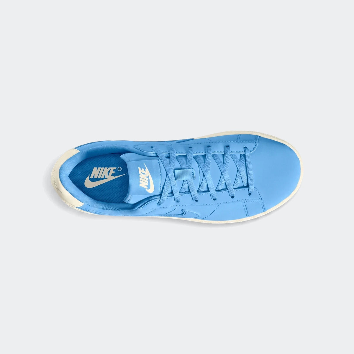 Nike Tennis Classic Big Kids' Shoes in light blue with white laces and sole, presented from a top-down perspective.