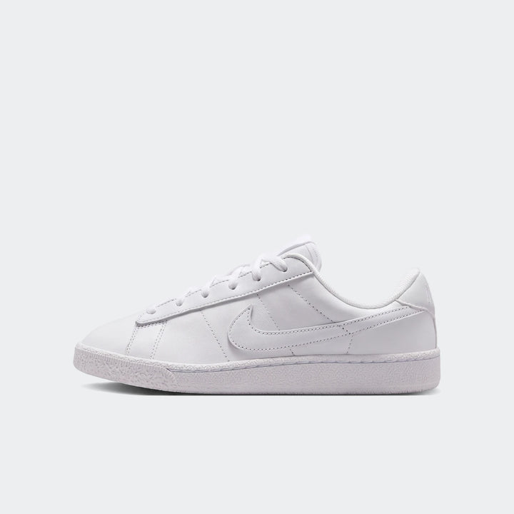 Nike Tennis Classic Big Kids' Shoes in white leather with lace-up closure and low-profile silhouette.
