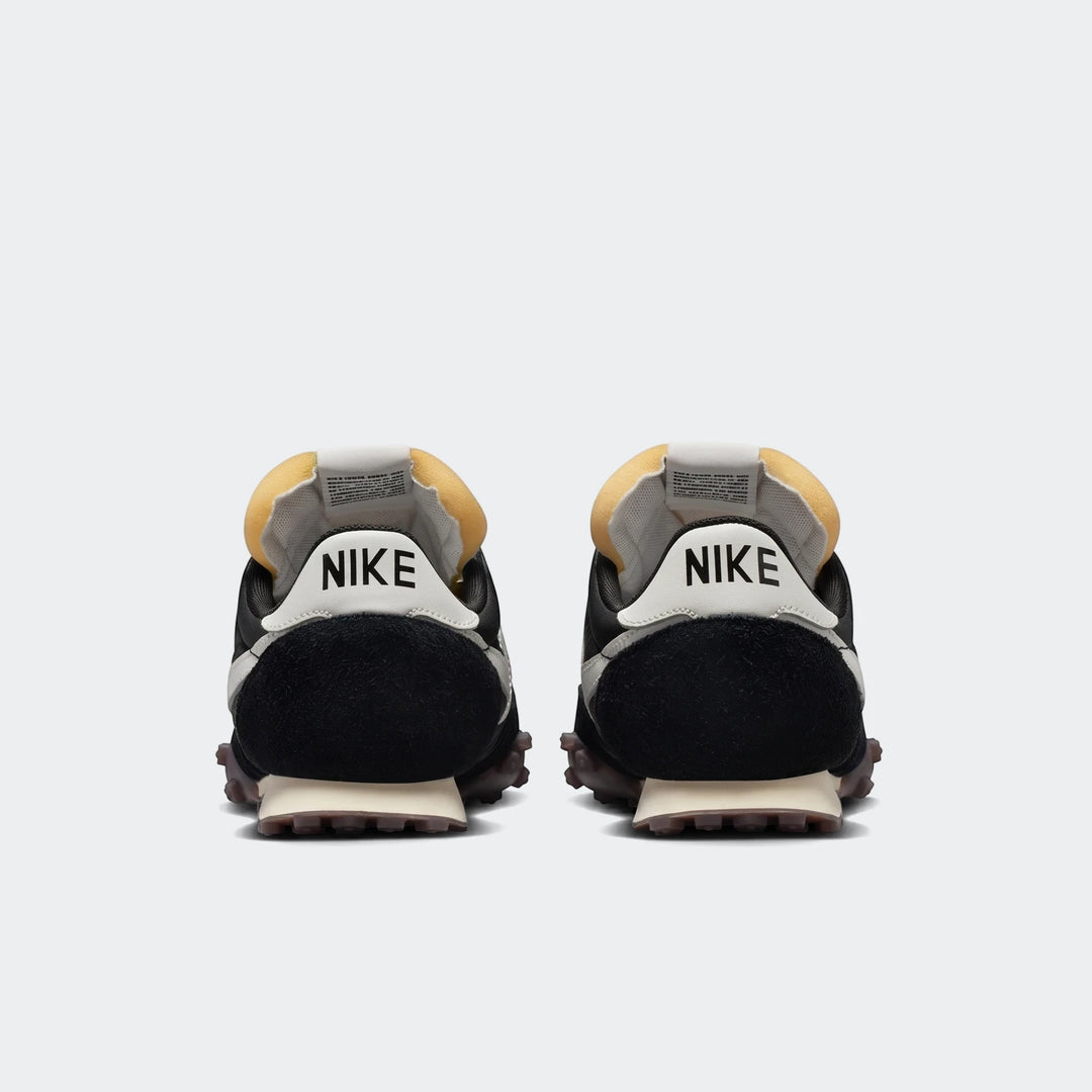 Nike Waffle Racer Black Or Grey Men's Shoes, rear view, featuring black suede and white leather accents.