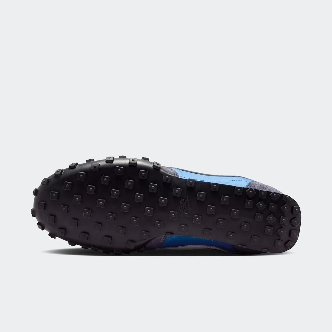 Nike Waffle Racer men's shoe in blue, gray, and black, showcasing the iconic waffle pattern sole from an overhead view.