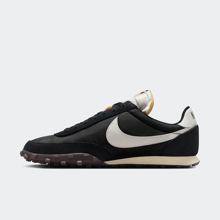 Nike Waffle Racer men's shoes in black and off-white, showcasing a classic running design and a distinctive waffle outsole