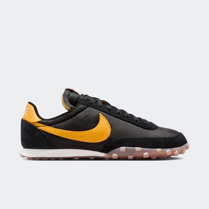 Nike Waffle Racer men's shoes in black and yellow, featuring a classic design and waffle outsole, side view.