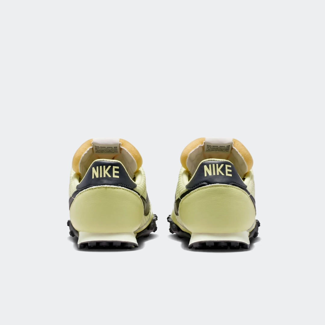 Nike Waffle Racer Se Green Men's Shoes, featuring a light green and dark grey upper with a distinct waffle outsole, seen