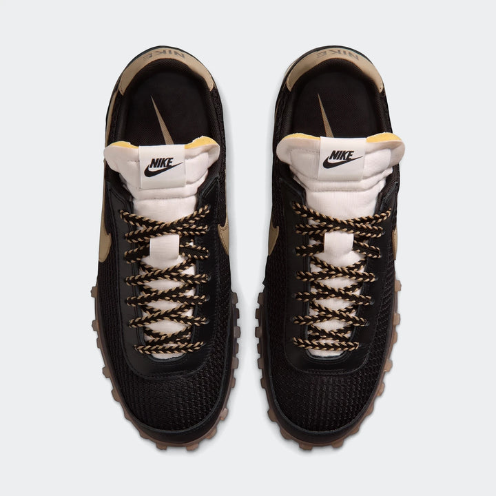 Black and beige Nike Waffle Racer Se men's shoes, designed with a mesh upper and waffle outsole, shown from a top-down