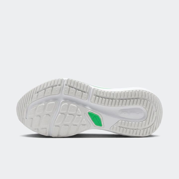 Bottom view of a Nike Winflo 12 men's road running shoe, featuring a textured white and grey sole with green accents and