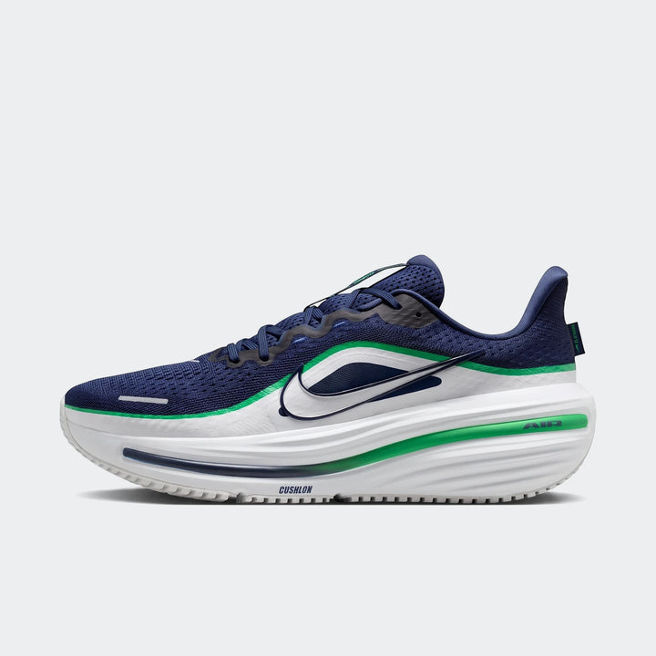 Nike Winflo 12 Men's Road Running Shoes in navy blue, white, and green, featuring a cushioned sole and mesh upper, shown in