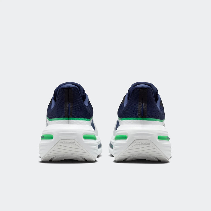 Nike Winflo 12 Men's Road Running Shoes, shown from the rear in dark blue and white with green accents.