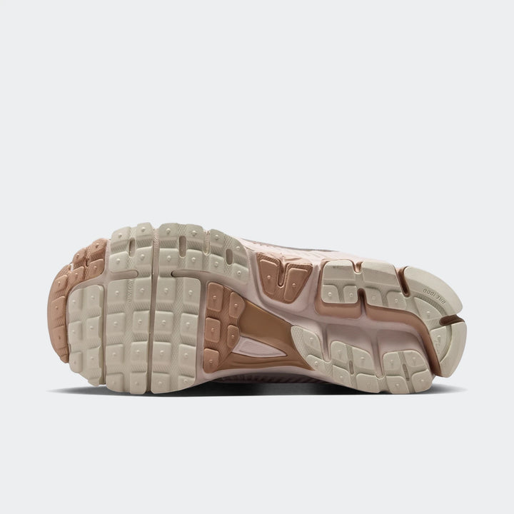 Nike Zoom Vomero 5 Women's Shoes, sole view, showcasing the durable tan, beige, and brown rubber outsole.