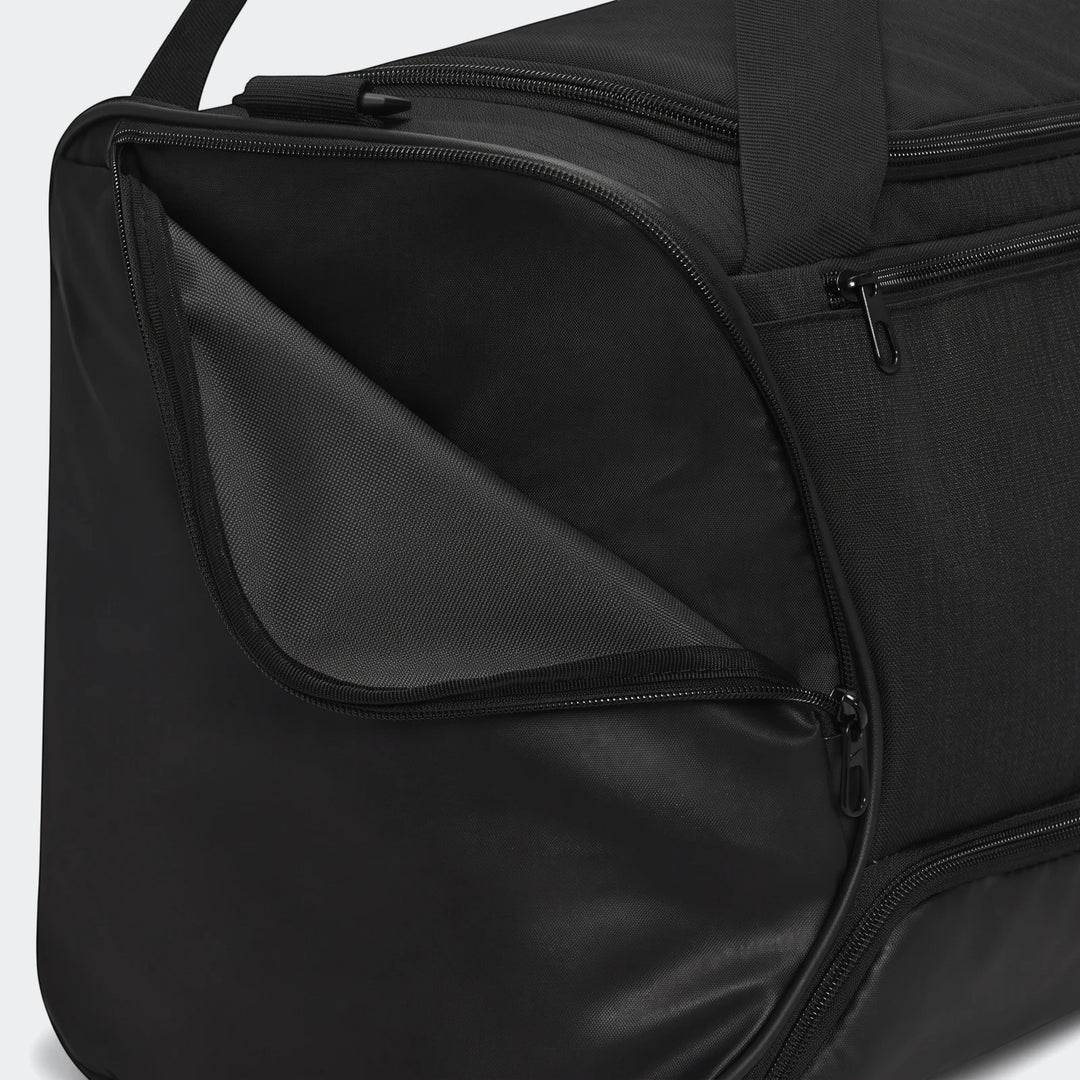 Large black duffel bag with a partially unzipped side pocket, featuring visible zippers and durable fabric.