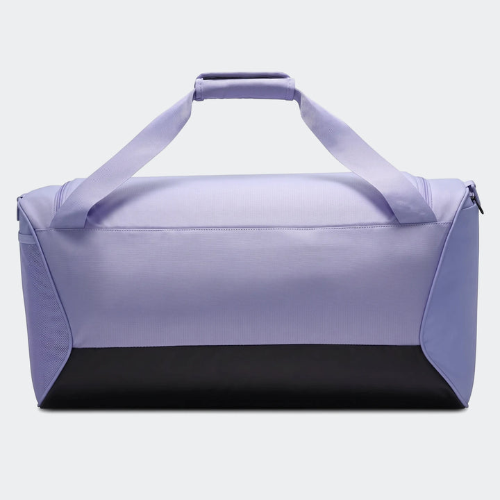Purple and black Nk Brsla M Duff 9.5 duffel bag, side view, for sports or travel.