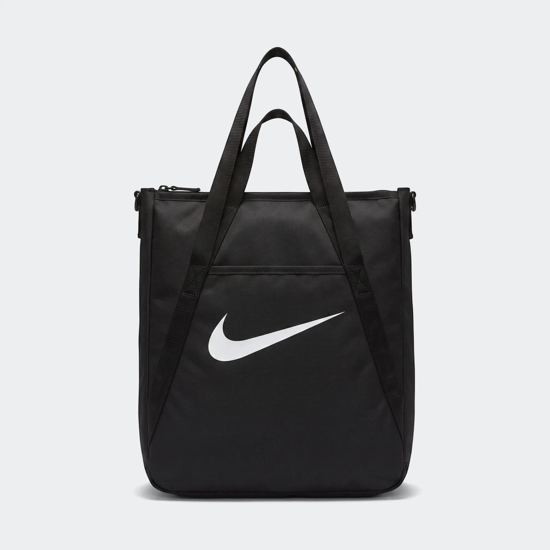 Nk Gym Tote Sp26 black tote bag with dual carry handles and large white logo, front view.