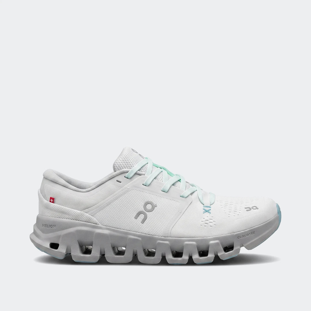 White and grey On Running Cloud X 5 sneakers with light blue laces, featuring a unique CloudTec sole design, presented in a