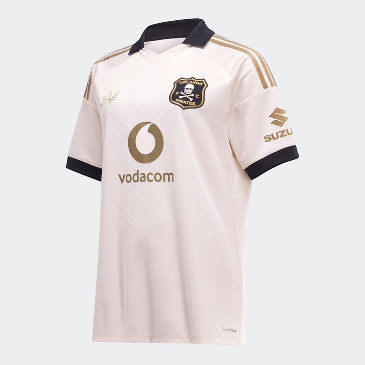 Orlando Pirates 26/27 Away Jersey in cream with black trim, gold logos, and a unique textured fabric, viewed from a slight