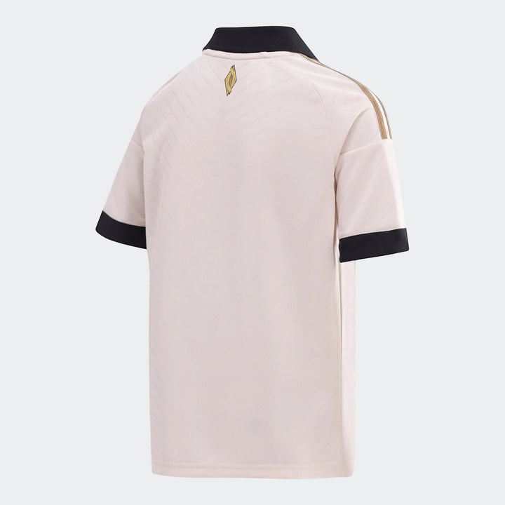 Orlando Pirates 26/27 Away Jersey Kids, featuring a light beige color with black collar and cuffs, and gold stripes, shown