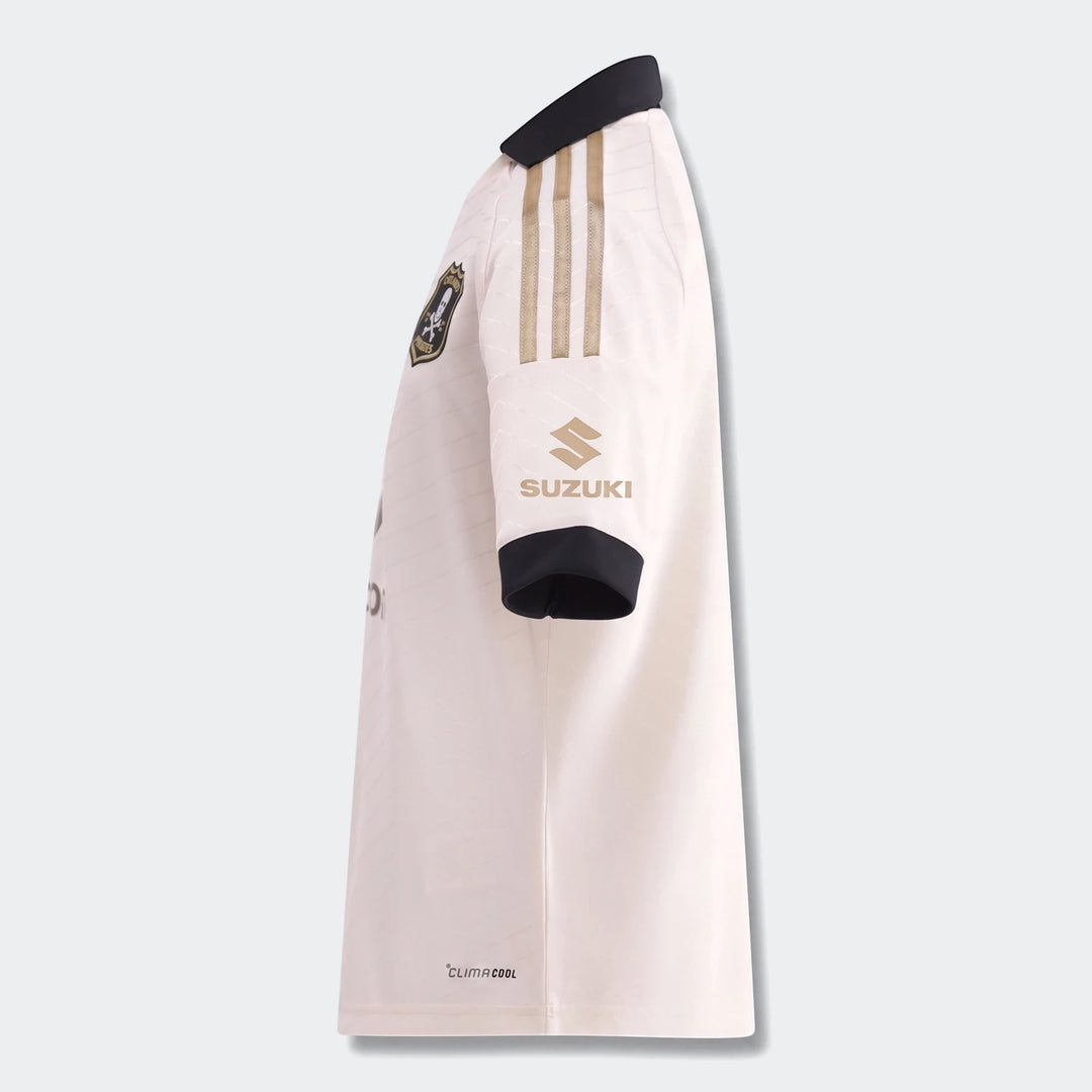 Orlando Pirates 26/27 Away Jersey for kids, featuring white fabric with gold Adidas stripes and Suzuki logo, viewed from the
