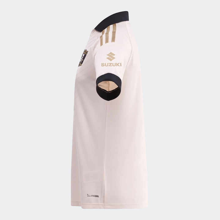 Side view of an Orlando Pirates 26/27 Away Jersey in off-white with black collar and gold Suzuki sponsor logo on sleeve.