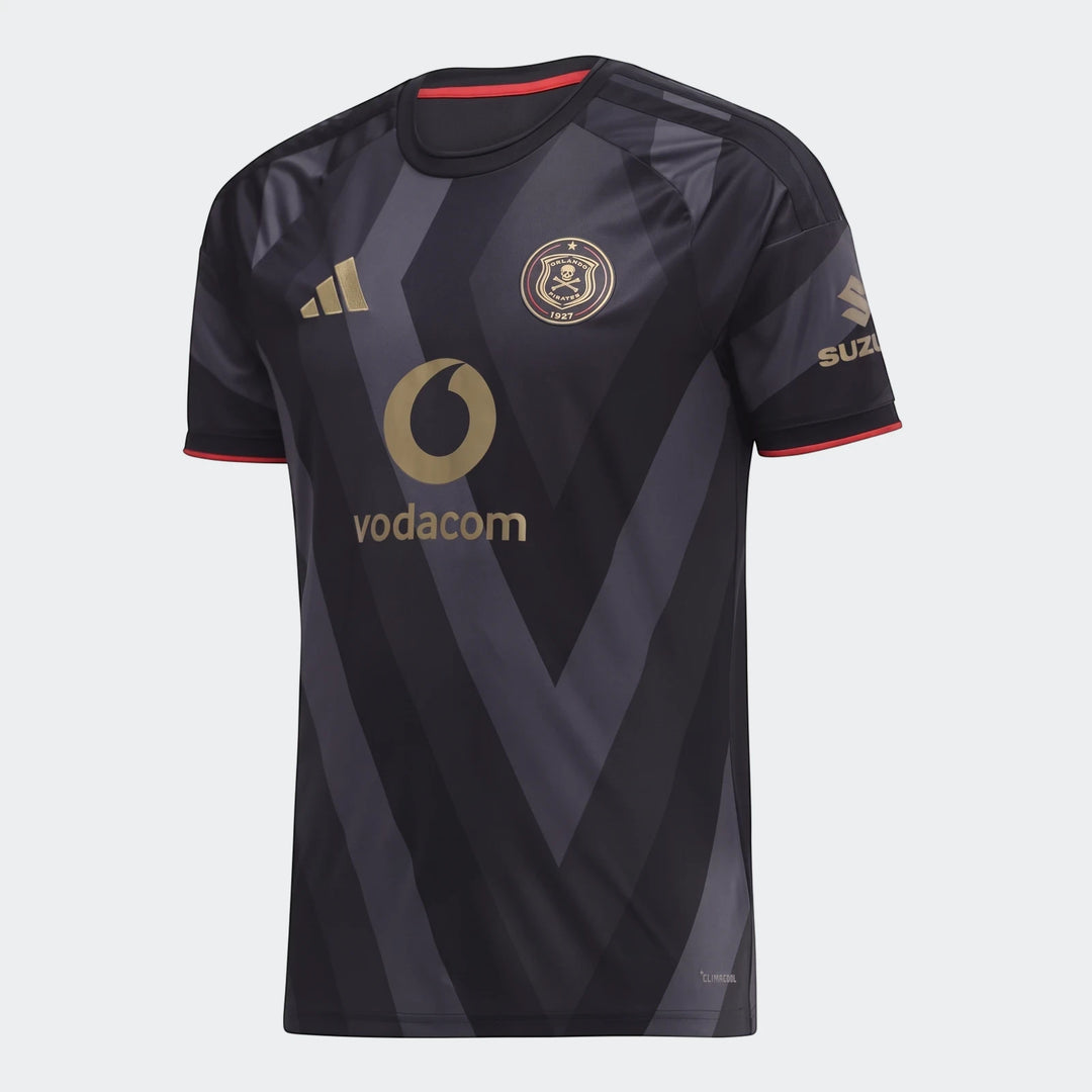 Orlando Pirates 26/27 home jersey in black with gold logos and a chevron pattern, displayed front view.