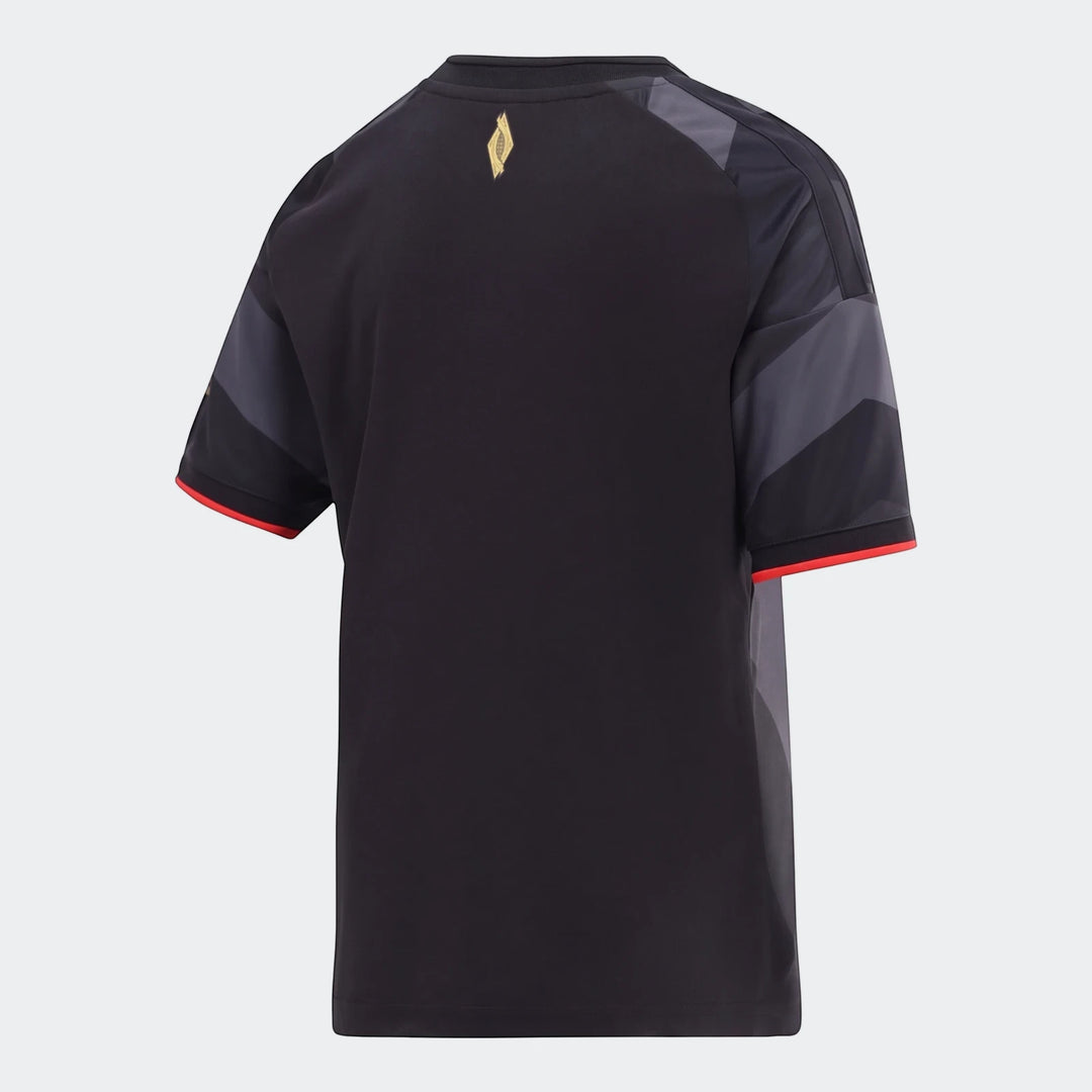 Back view of the Orlando Pirates 26/27 Home Jersey for kids, featuring a black design with dark gray shoulder panels, red