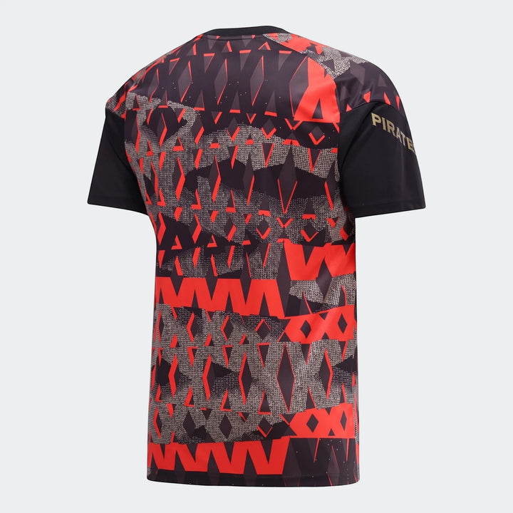 Orlando Pirates 26/27 Pre Match Jersey, back view, featuring a black, red, and grey geometric pattern and short sleeves.