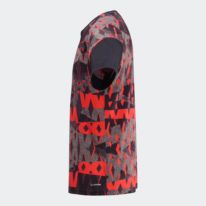 Orlando Pirates 26/27 Pre Match Jersey, featuring a black and red geometric pattern, shown from a side angle.