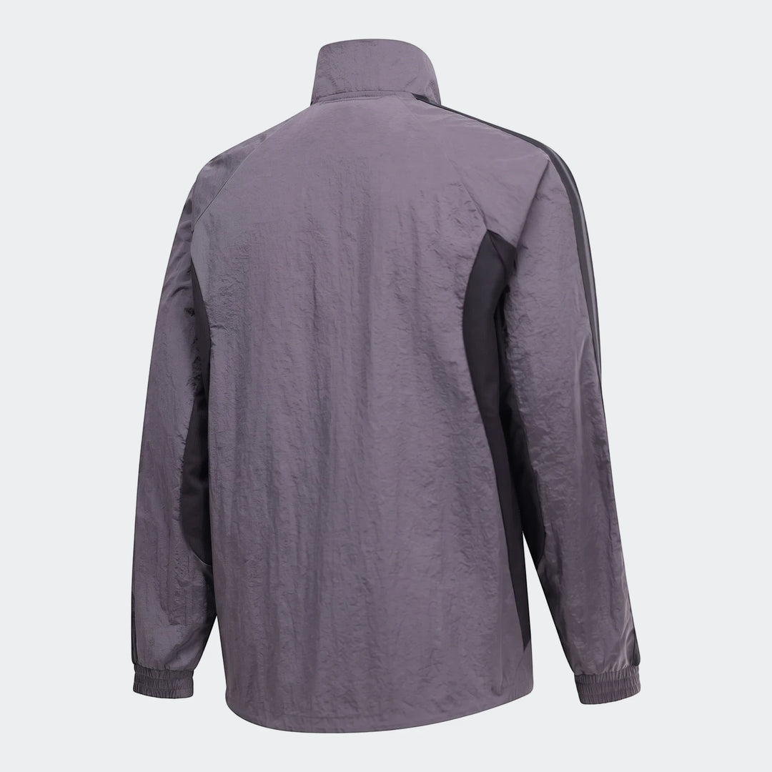Grey Orlando Pirates Home Anthem Jacket, back view, featuring a crinkled texture and black stripe details.