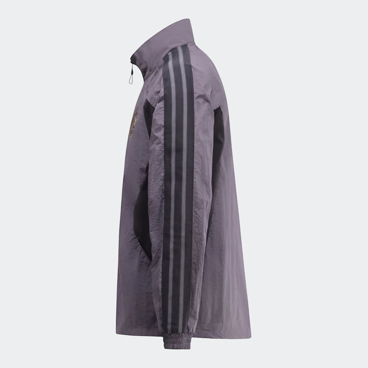 Orlando Pirates Home Anthem Jacket in grey/lavender, featuring dark grey sleeve stripes and a subtle team logo, shown in a