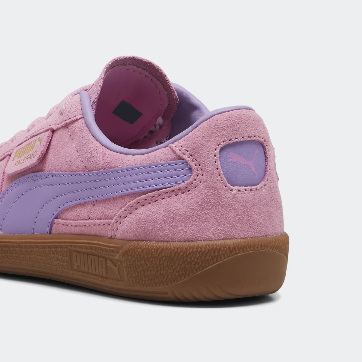 Palermo Ps Orange Sneakers in a back-right view, featuring pink suede and purple leather details with a gum sole.