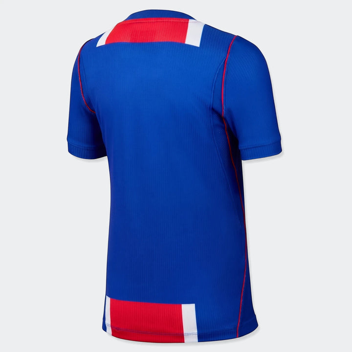 Back view of a Paris Saint-Germain 2026/27 Stadium Home Big Kids' Nike Dri-Fit Soccer Replica Jersey in vibrant blue with