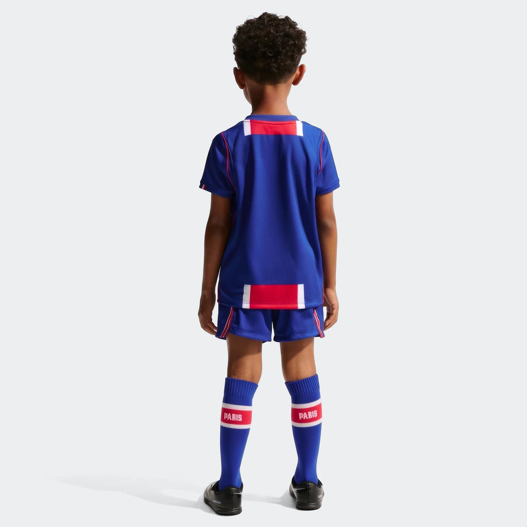Paris Saint-Germain 2026 Stadium Home Little Kids' Nike Soccer Replica 3-Piece Kit shown from the back, featuring a blue