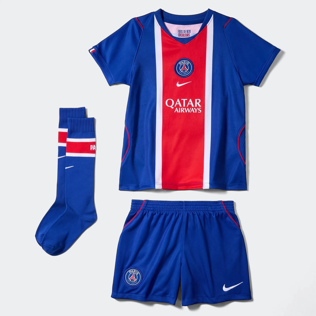 Paris Saint-Germain 2026 Stadium Home Little Kids' Nike Soccer Replica 3-Piece Kit in blue, red, and white, displayed flat.