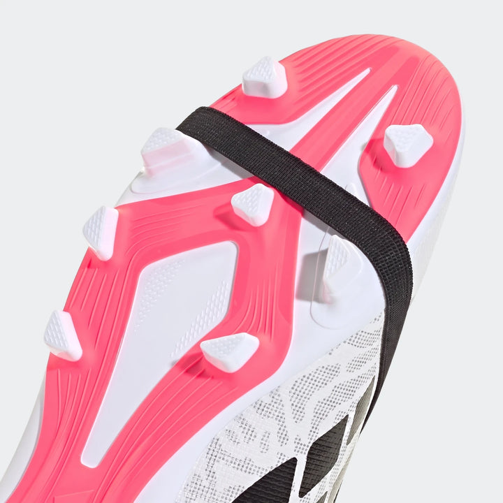 Kids Predator Club football boot in white, pink, and black, featuring the sole with studs and an elastic strap.