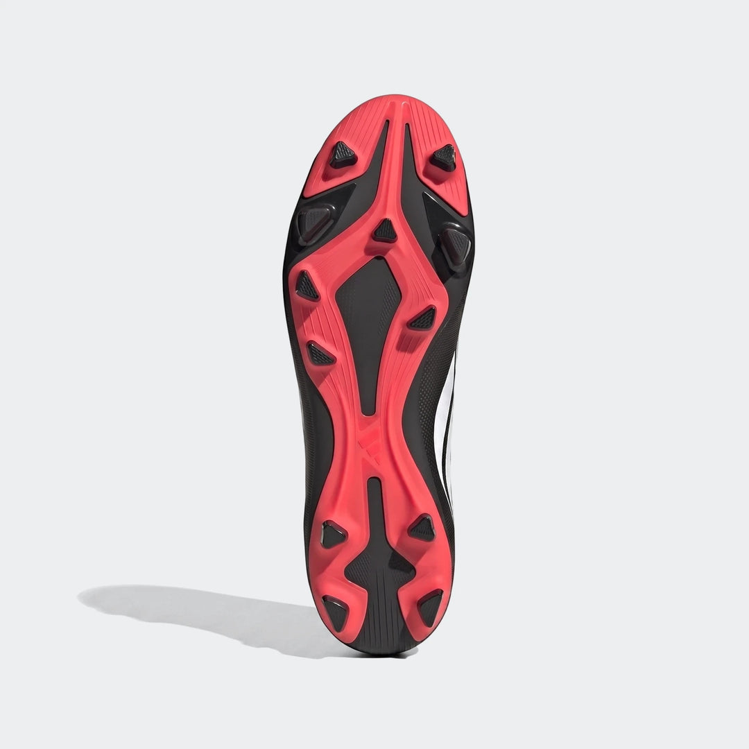 Predator Club Firm Ground Multi Ground Football Boots, black and coral/red, showing the sole with studs.